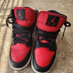 Jordan 1 mids black white and red